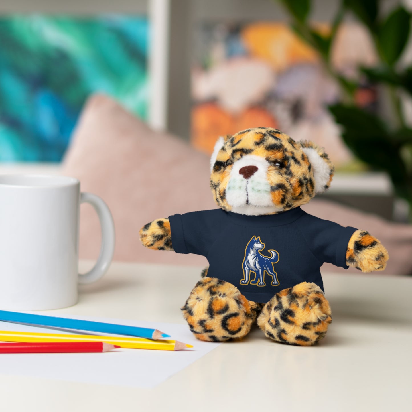 Huggable Huskies β 8" Plush Buddies w/ Logo Tee (Pick Your Animal + Tee Color)