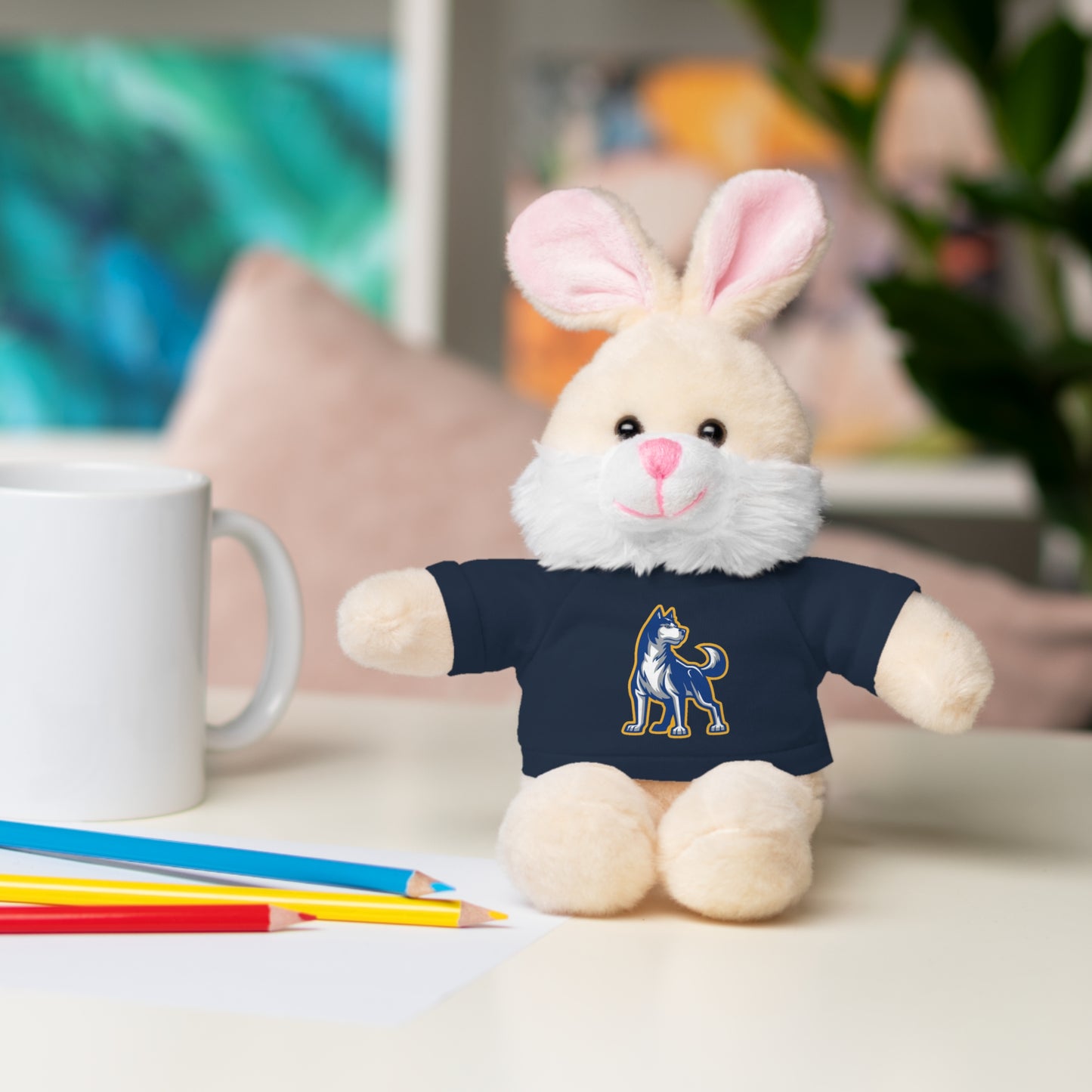 Huggable Huskies β 8" Plush Buddies w/ Logo Tee (Pick Your Animal + Tee Color)